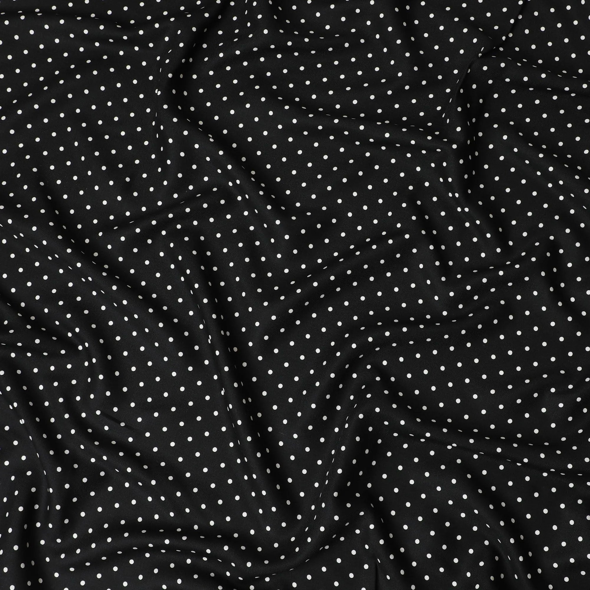 Black viscose crepe printed fabric with white prints in polka dot design-D11157