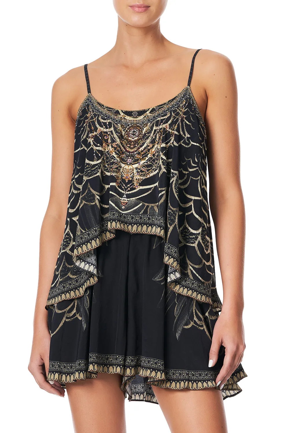 FLARED PLAYSUIT WITH OVERLAYER UNDER A FULL MOON