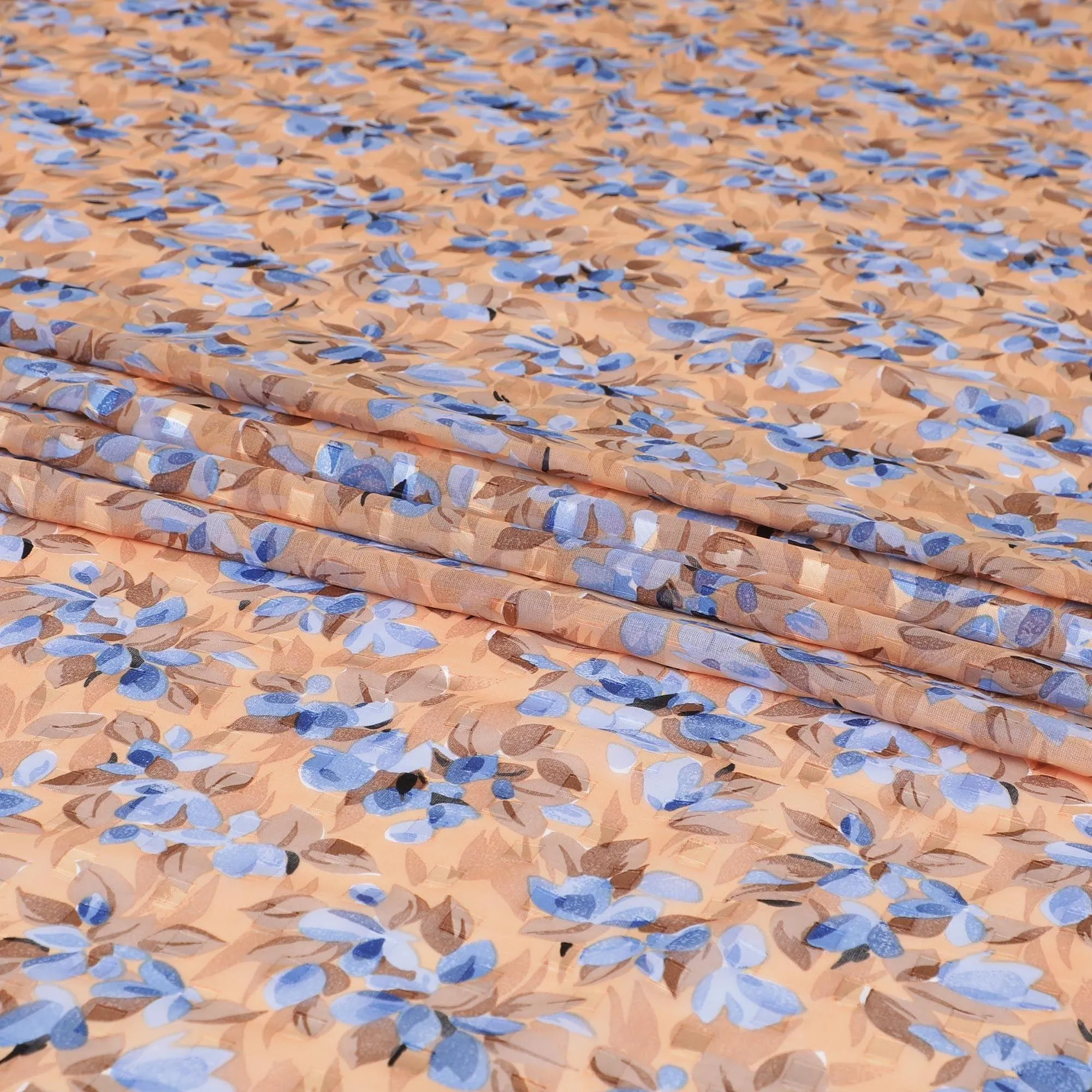 Light peach Swiss cotton voile fabric with baby blue, Peru brown and black floral print having clip cord design-D6773