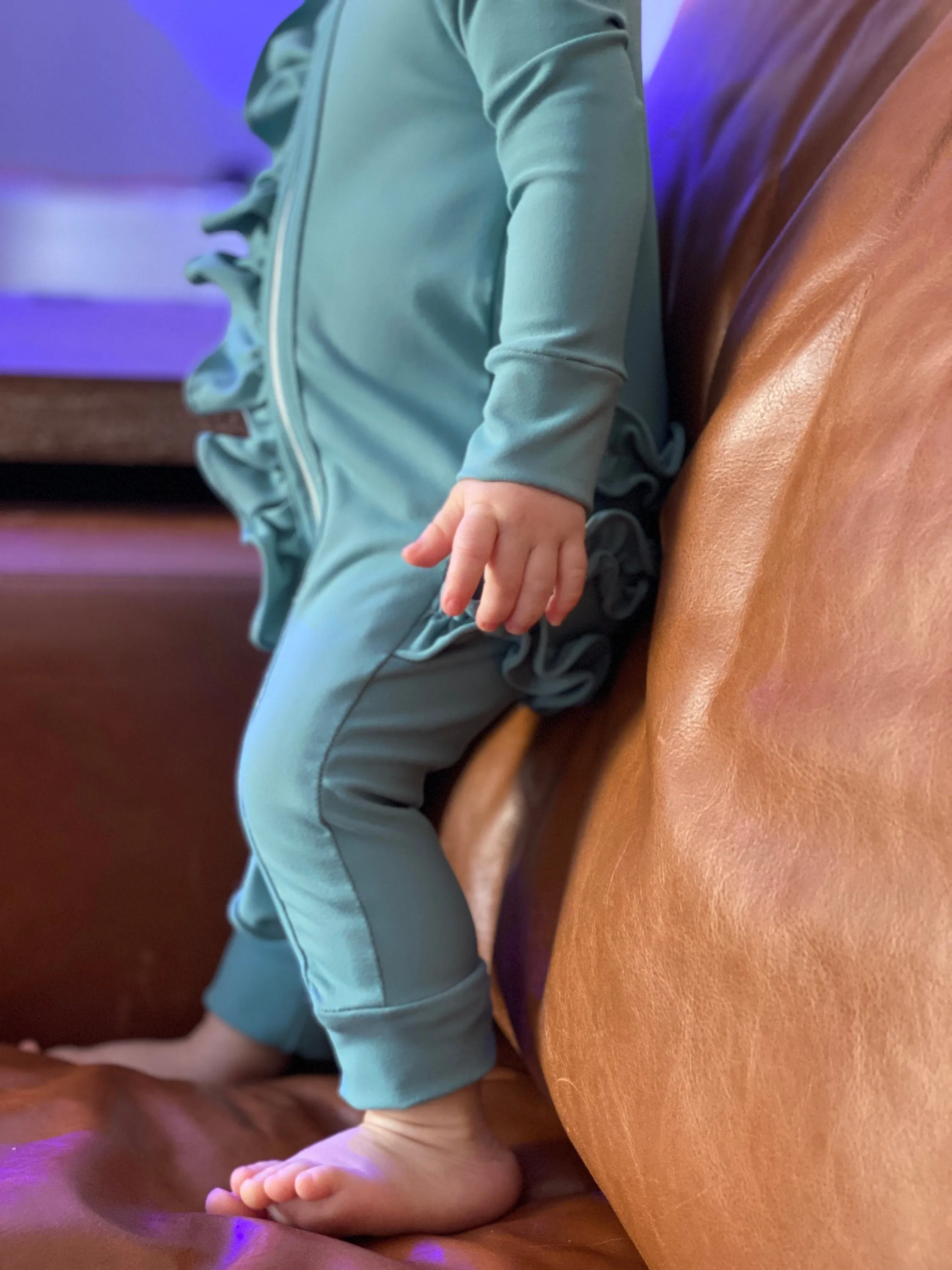 Ruffle zip romper