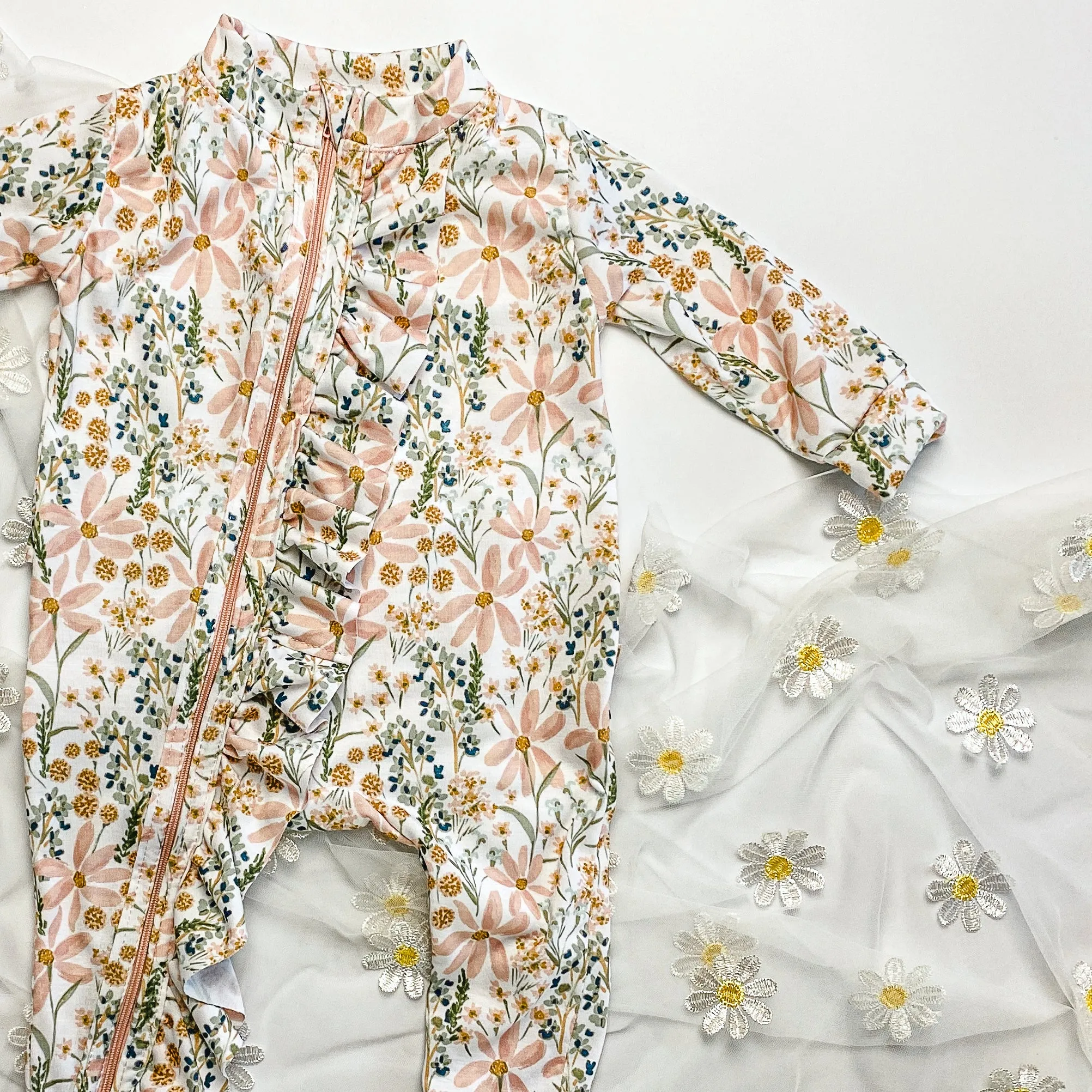 Ruffle zip romper